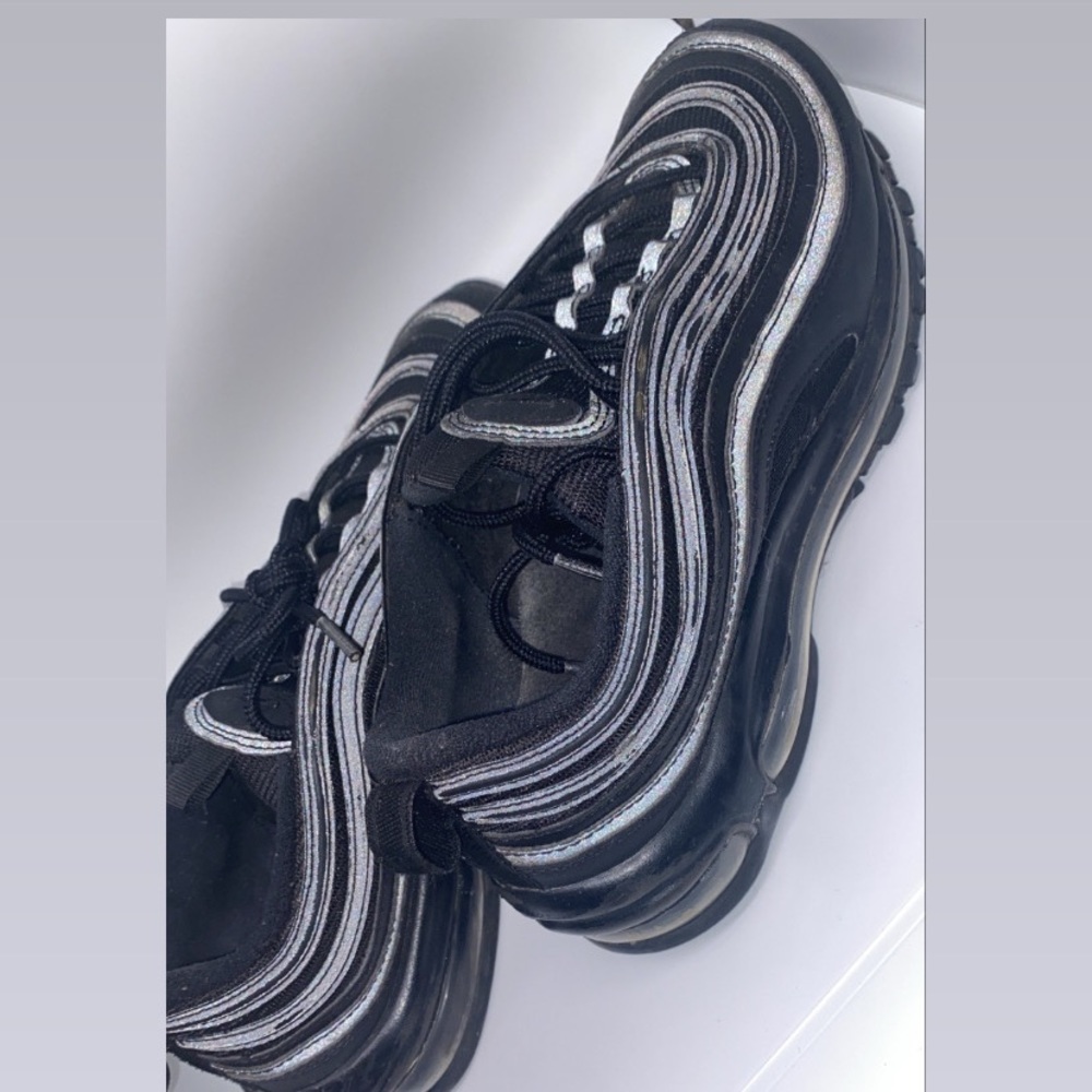 Nike Air Max 97s.